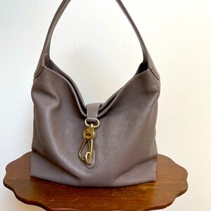 DOONEY & BOURKE LP LEATHER LOGO LOCK SAC.